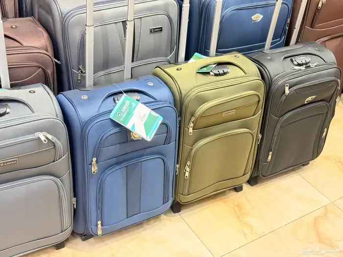 شنطه ترولي مقاس 20 انش توضع في درج الطائره 2