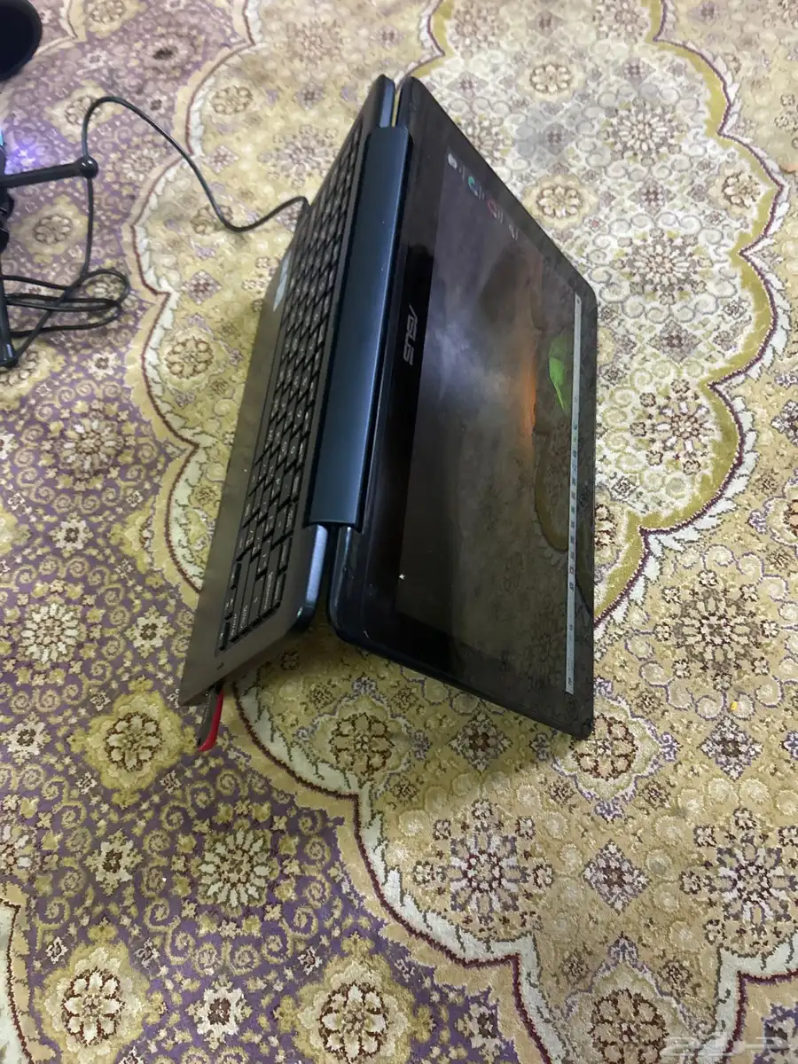 لابتوب اسوس حجم صغير بحالة ممتازة جدا  يعمل بلمس وقابل لطي 4