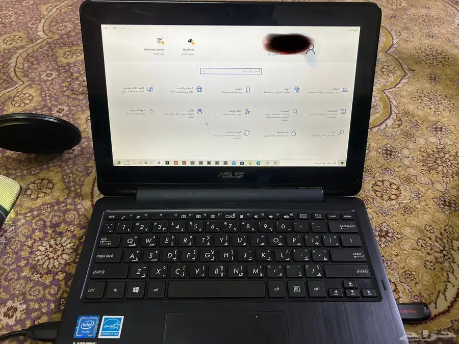 لابتوب اسوس حجم صغير بحالة ممتازة جدا  يعمل بلمس وقابل لطي 0