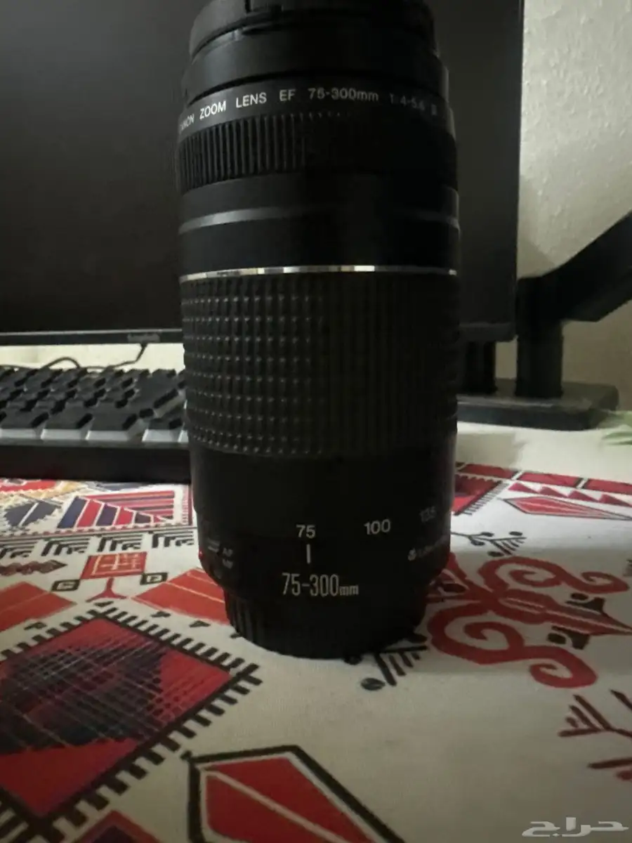 عدسة كانون 75-300 1