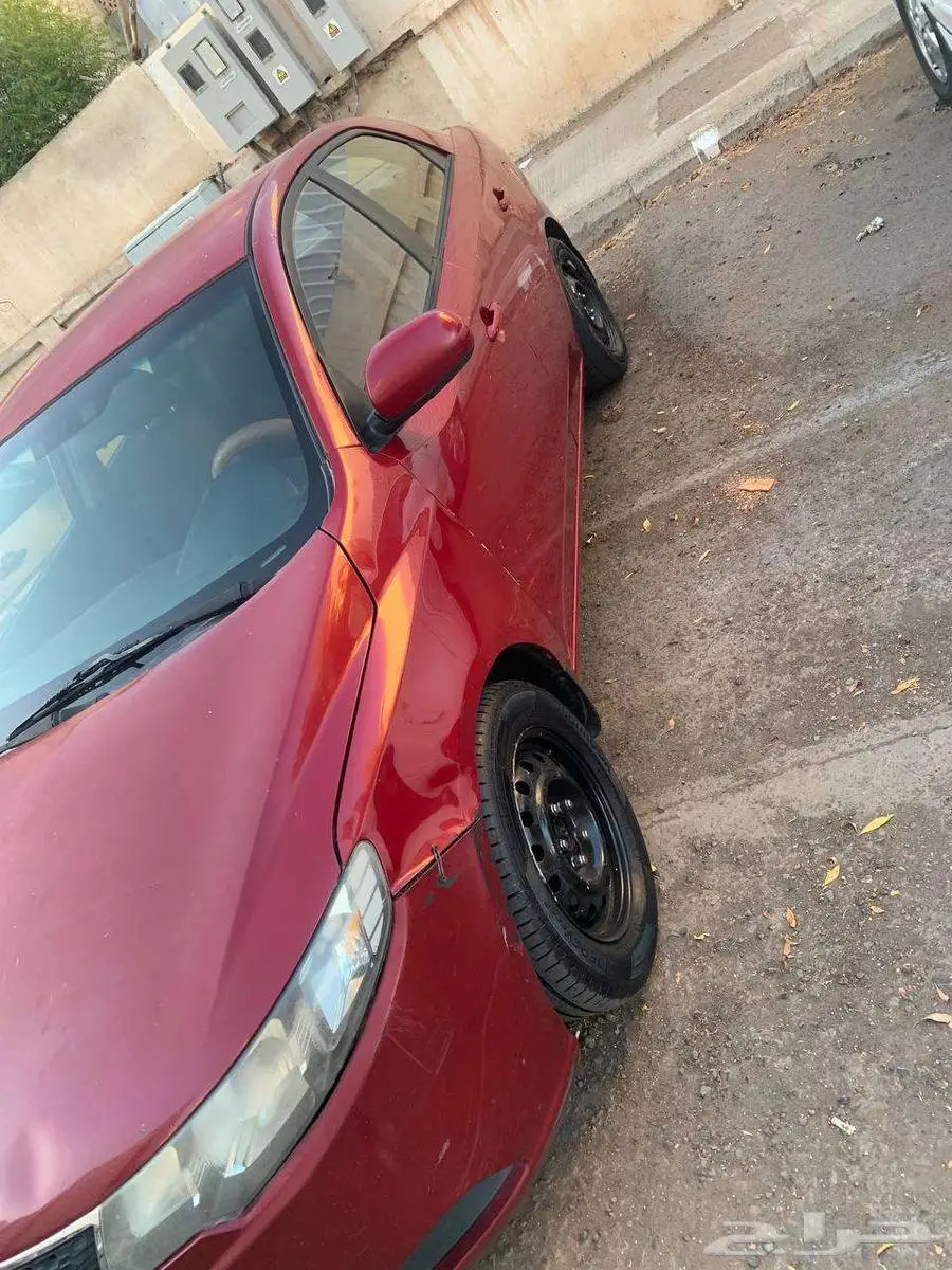كيا سيراتو LX 2013 9