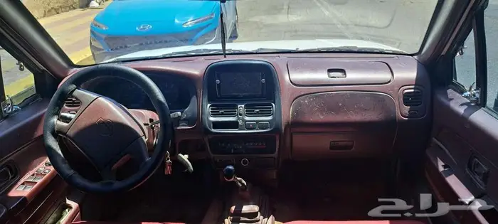 نيسان ددسن غمارتين موديل 2000 4