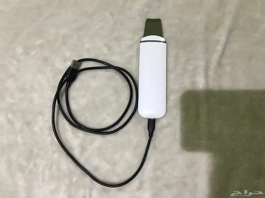 جهاز تنظيف وتقشير البشره مع شاحنها 2