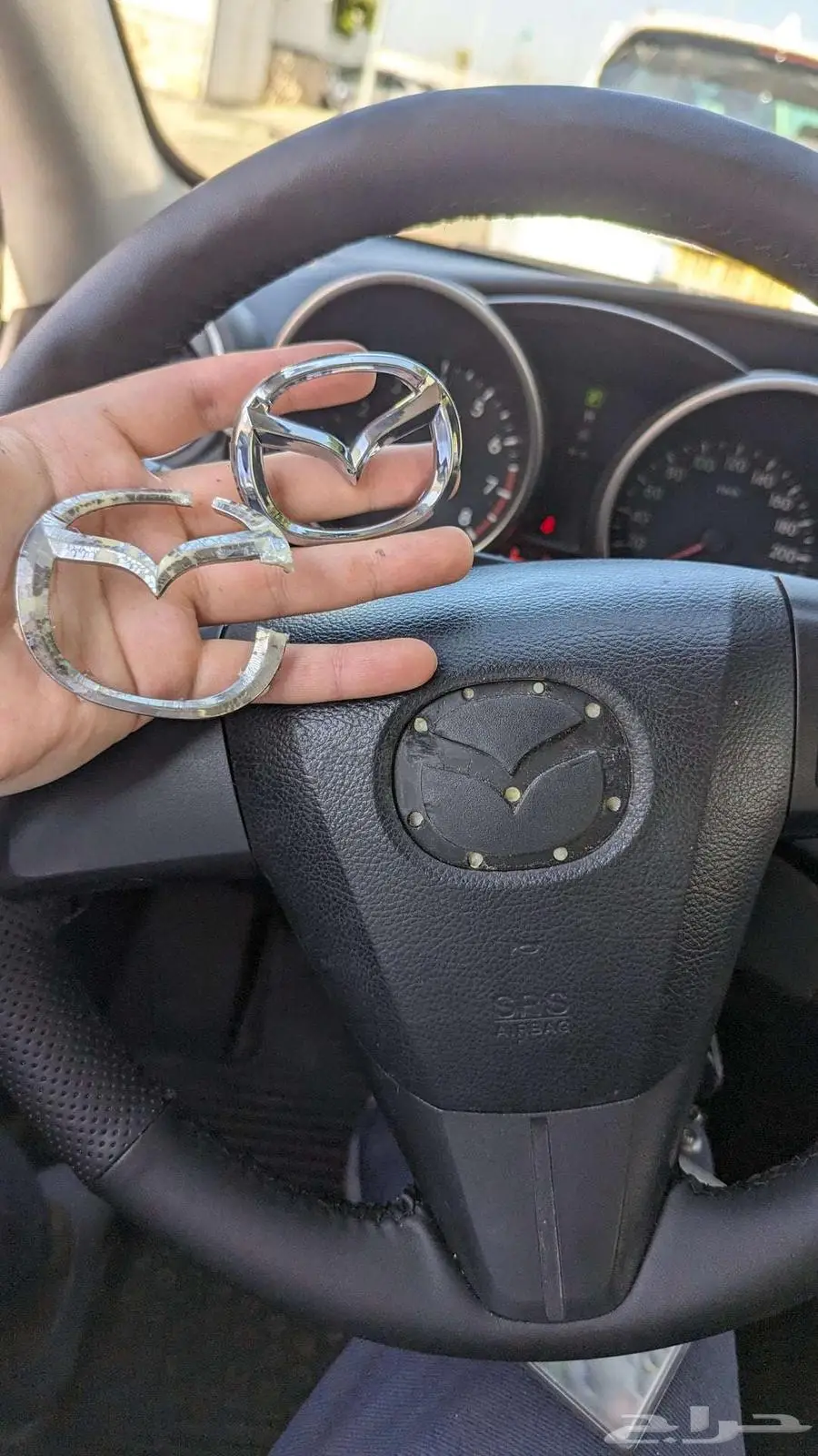 علامة دركسون مازدا 0
