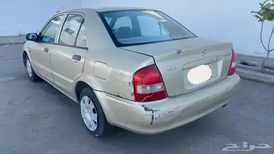 مازدا 2001 قير عادي نظيفه 323 السوم 7000 5