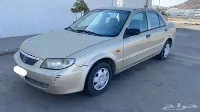 مازدا 2001 قير عادي نظيفه 323 السوم 7000 2