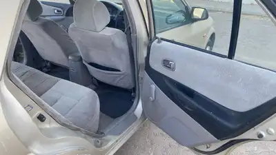 مازدا 2001 قير عادي نظيفه 323 السوم 7000 10