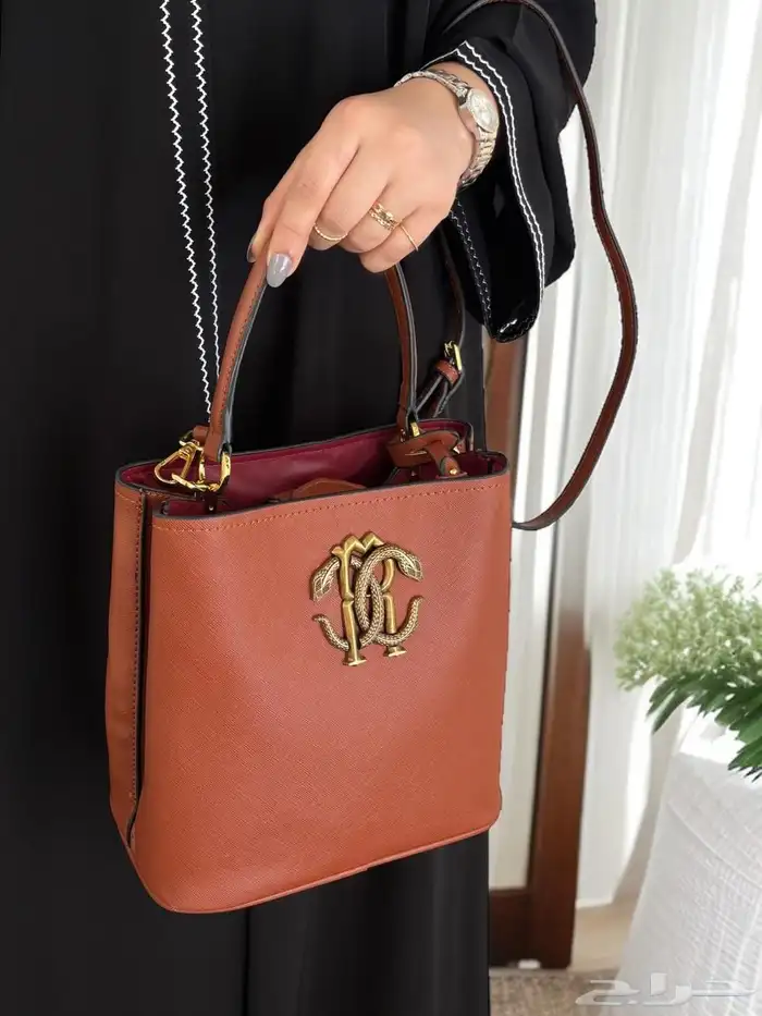 شنط هرمز شانيل دي جي سان لوران جي دبليو 34