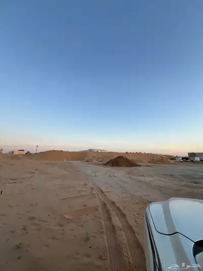 للايجار ارض 4576م حي الرمال 1