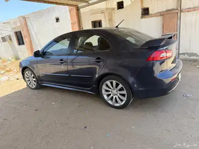 سيارة لانسر 2009 فل كامل اكسكيوسف فتحة سقف دخول زكي بصمه 1