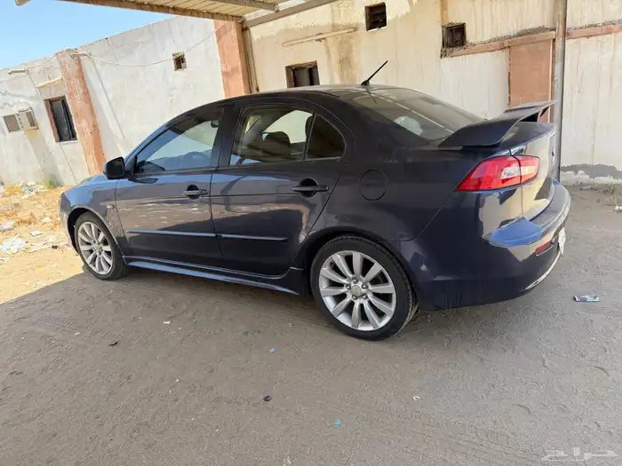 سيارة لانسر 2009 فل كامل اكسكيوسف فتحة سقف دخول زكي بصمه 1
