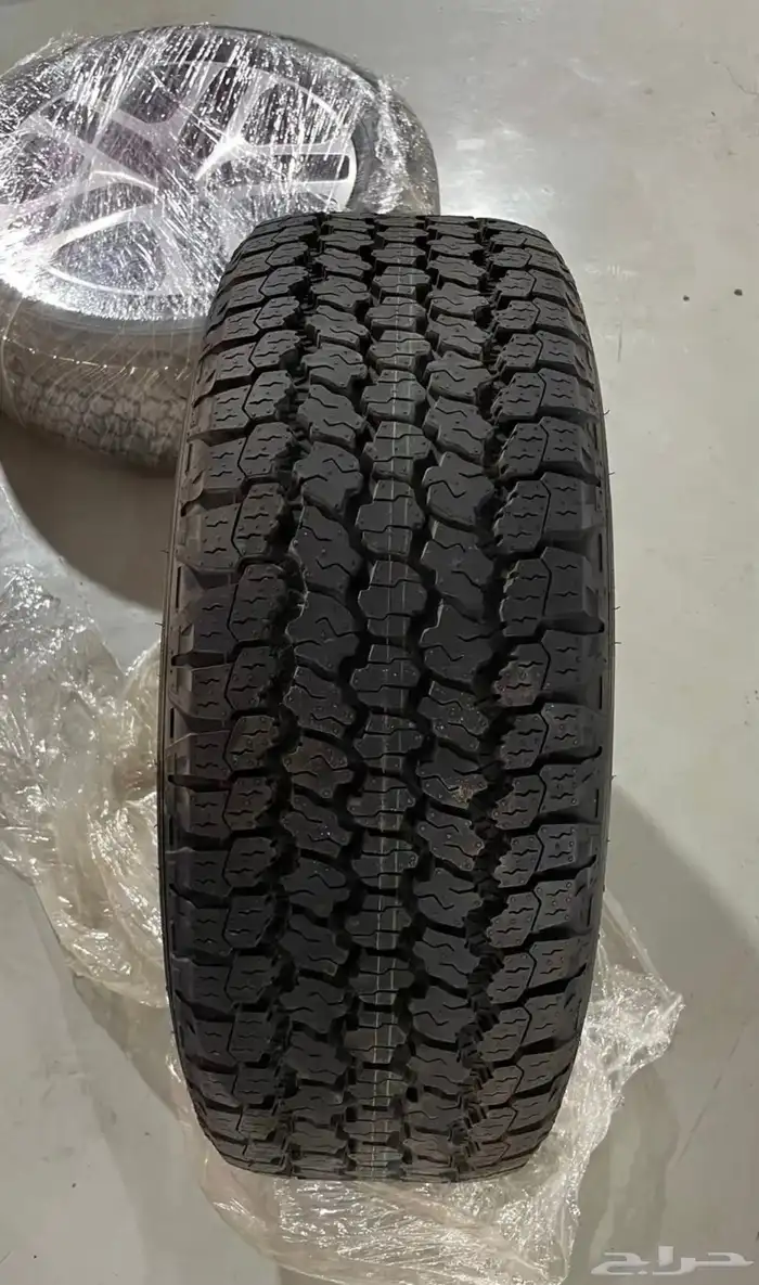5 جنوط ديفندر HSE جدد مع كفرات نص حجري قوديير 3