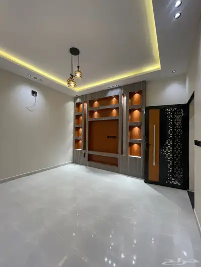 للبيع دور ارضي وملحق حي اليرموك ( شارعين ) بموقع مميز 3