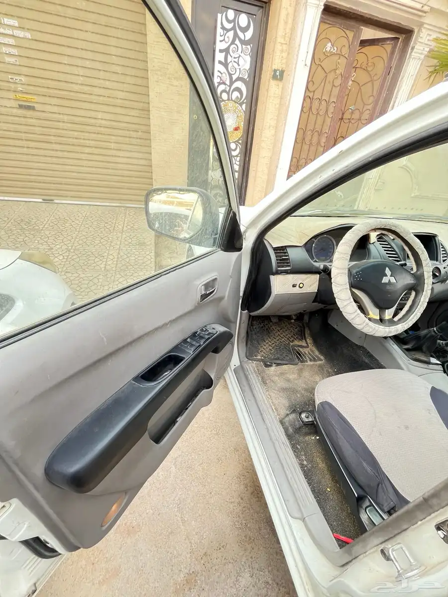 مستبيشي L200 2009 10