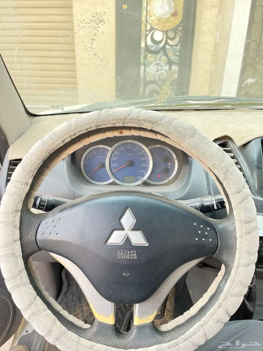 مستبيشي L200 2009 6