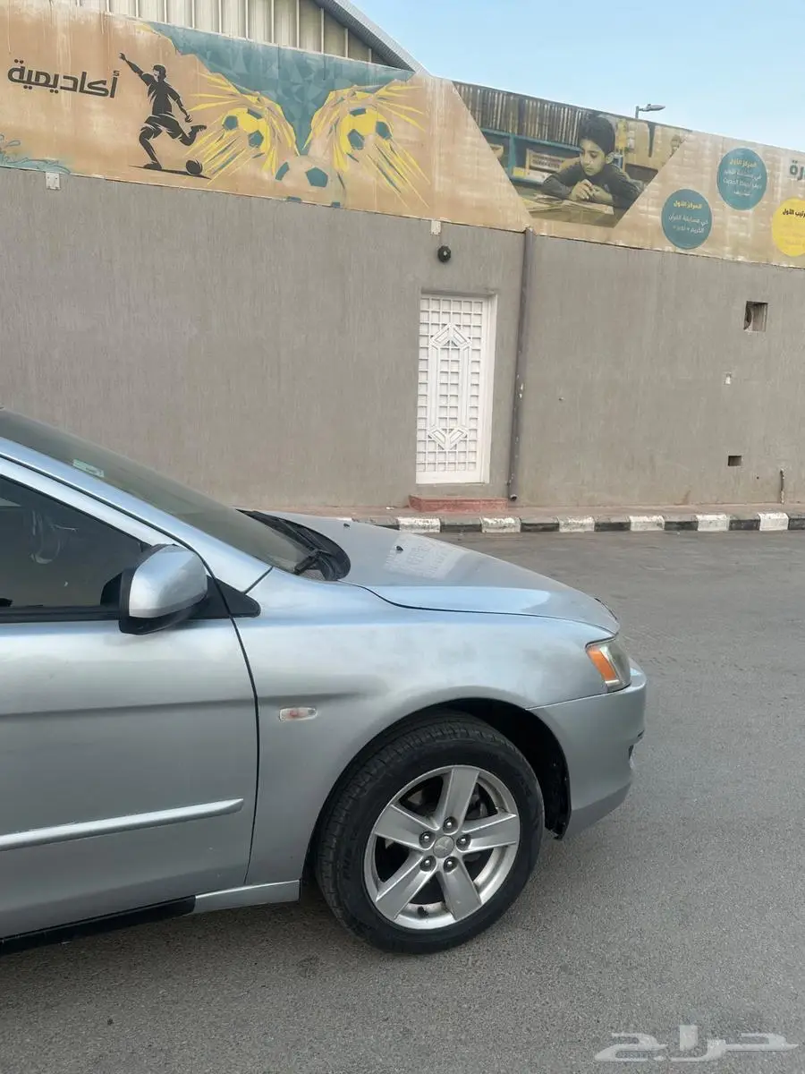 للبيع لانسر 2009 6