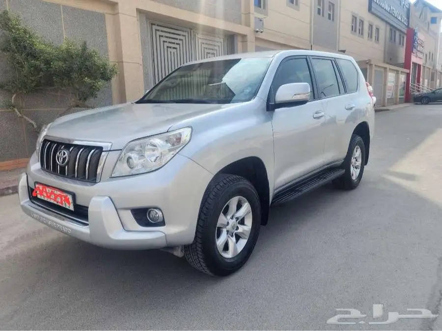 Toyota Prado 2013  4 cylinders  Silver  very clean 1
