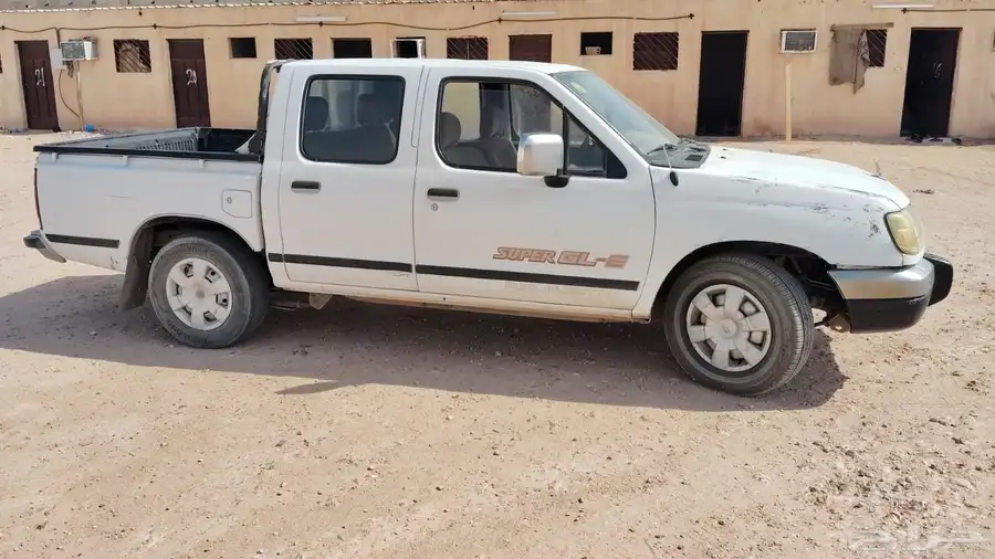نيسان بكب غمارتين فل كامل نضيفه موديل 2001 كفرات جدد 0