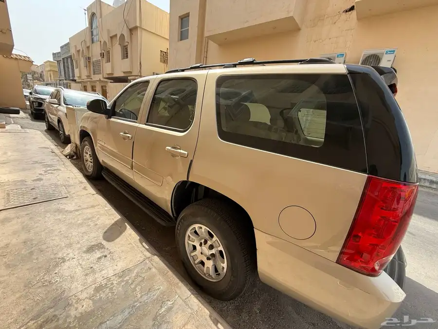 يوكن 2008 دبل لون ذهبي ممشى 52 الف 1