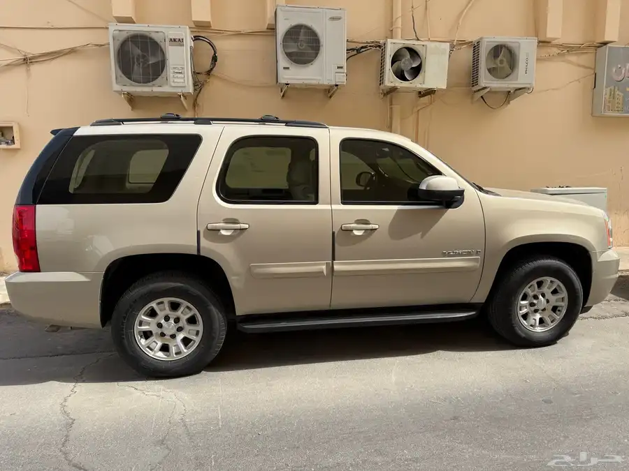 يوكن 2008 دبل لون ذهبي ممشى 52 الف 4