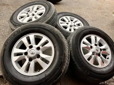 جنوط جيب 2009 مع كفرات صيني دعسة دنلوب مقاس 265 70 17 0