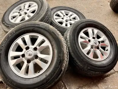 جنوط جيب 2009 مع كفرات صيني دعسة دنلوب مقاس 265 70 17 1