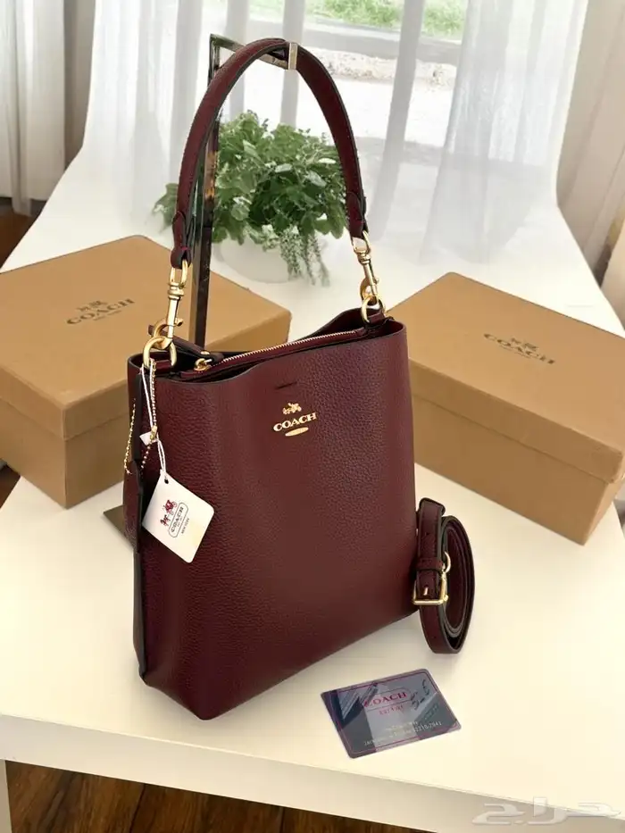 شنط هرمز وكوتش وتوري بورش جديدة اشكال متنوعه واسعار مميززه 56