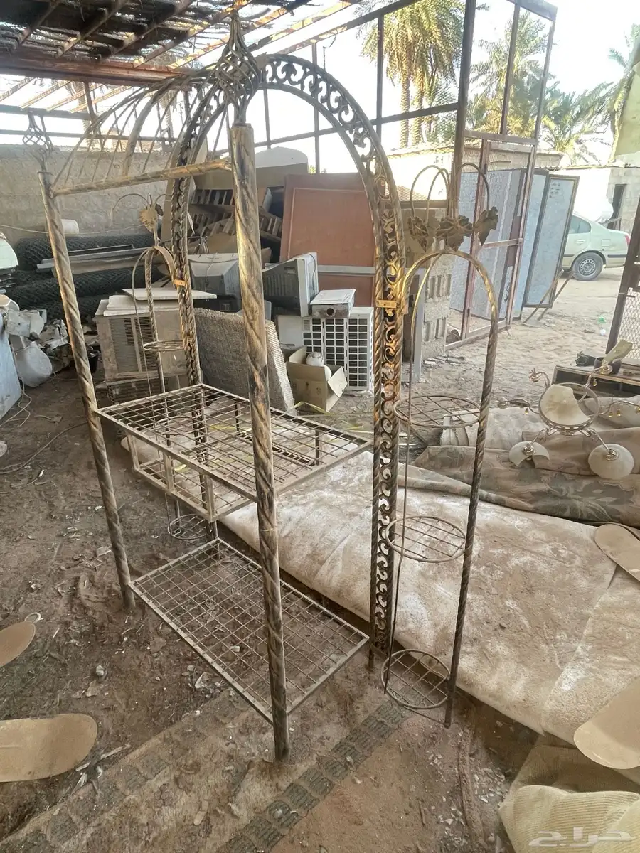 طاولة تلفزيون حديد مشغول 0
