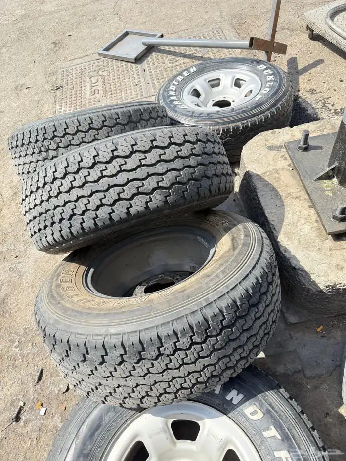 جنوط نيسان فتك مقاس 16 اصلي وكال مع كفرات دنلوب 1