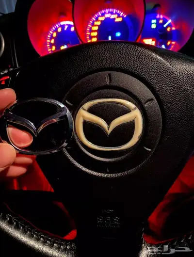 علامة دركسون شعار مازدا 0