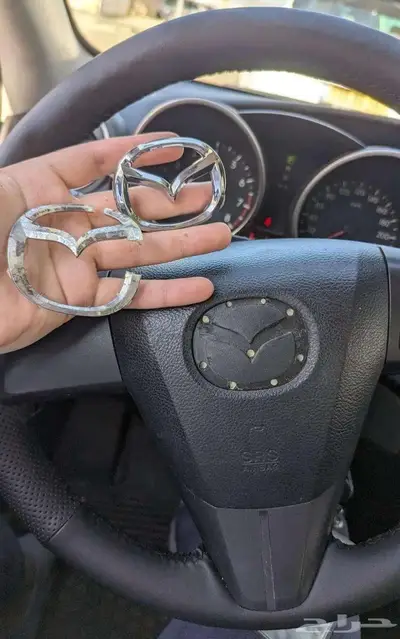 علامة دركسون شعار مازدا 1