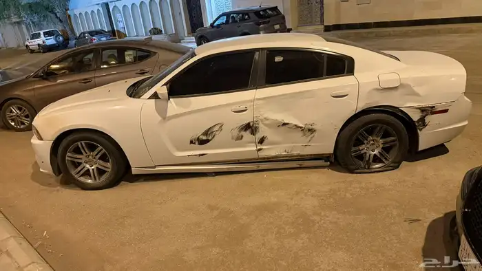 تشارجر 2014 صدمه خفيفه (مباع) 1