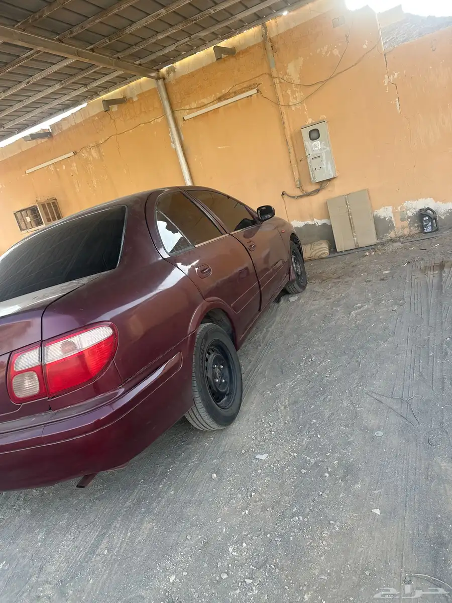 سياره صني مديل 2001 الون احمر القير تماتيك محركات تمام ا 3