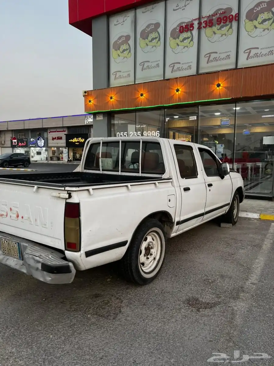 نيسان ددسن 2002 غمارتين 0