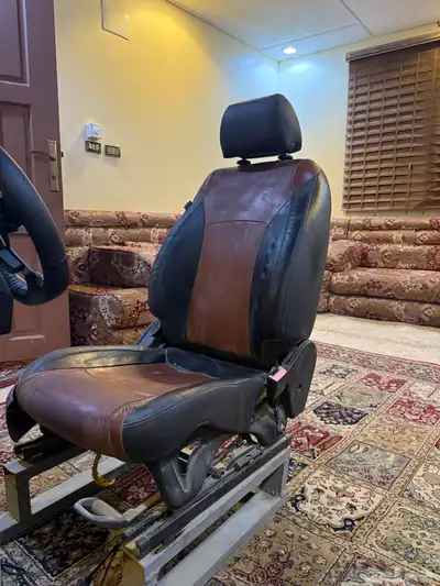 اكس بوكس مع طارة و كرسي سيارة سبورت و لعبة فورزا 4