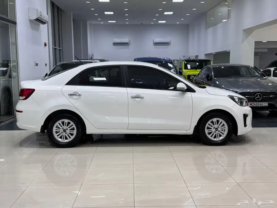 Kia Pegas 2025 (White) 4
