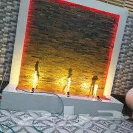شلالات ونوافير مودرن وعشب جداري 6