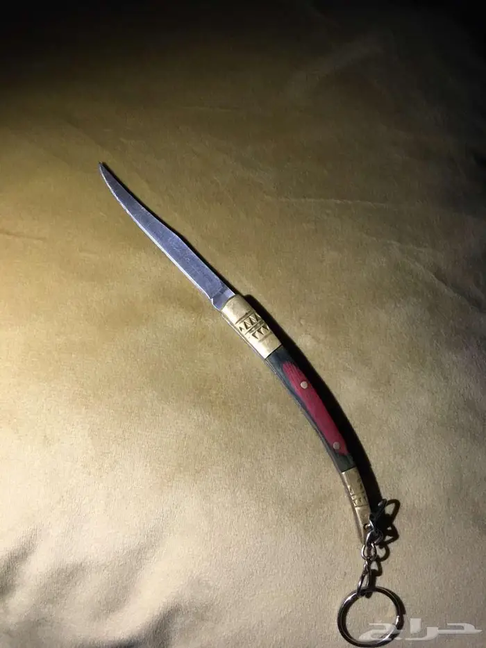 سكين خوجه صغيره مخشبه وفيها ميداليه حاده 2