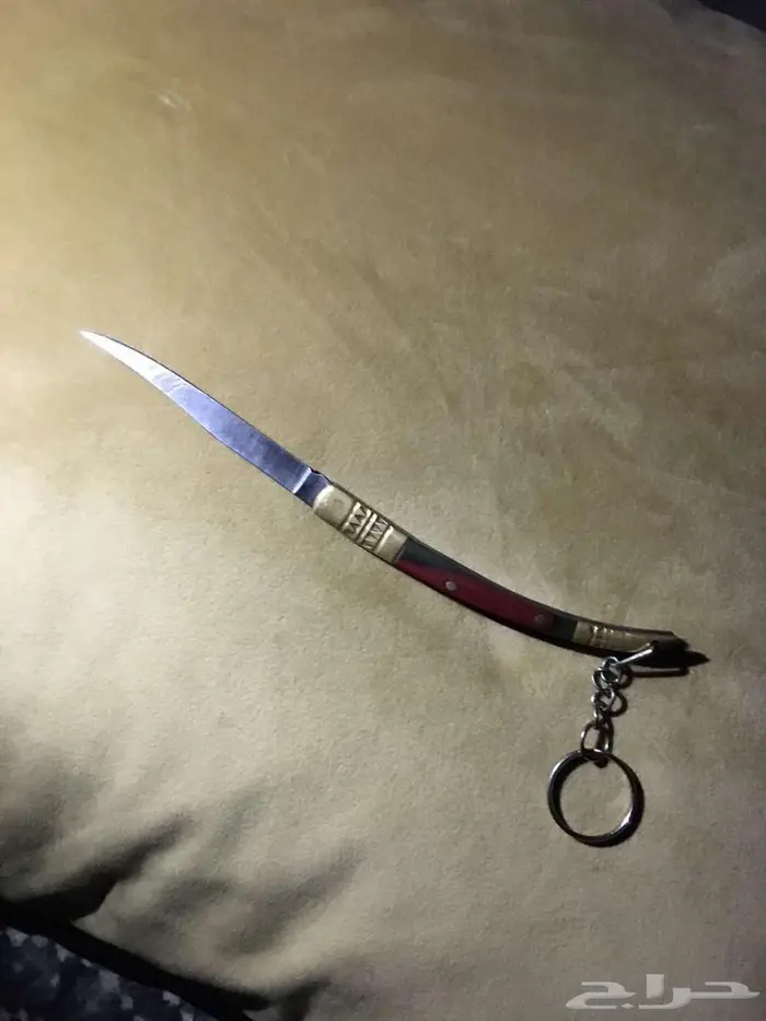 سكين خوجه صغيره مخشبه وفيها ميداليه حاده 3