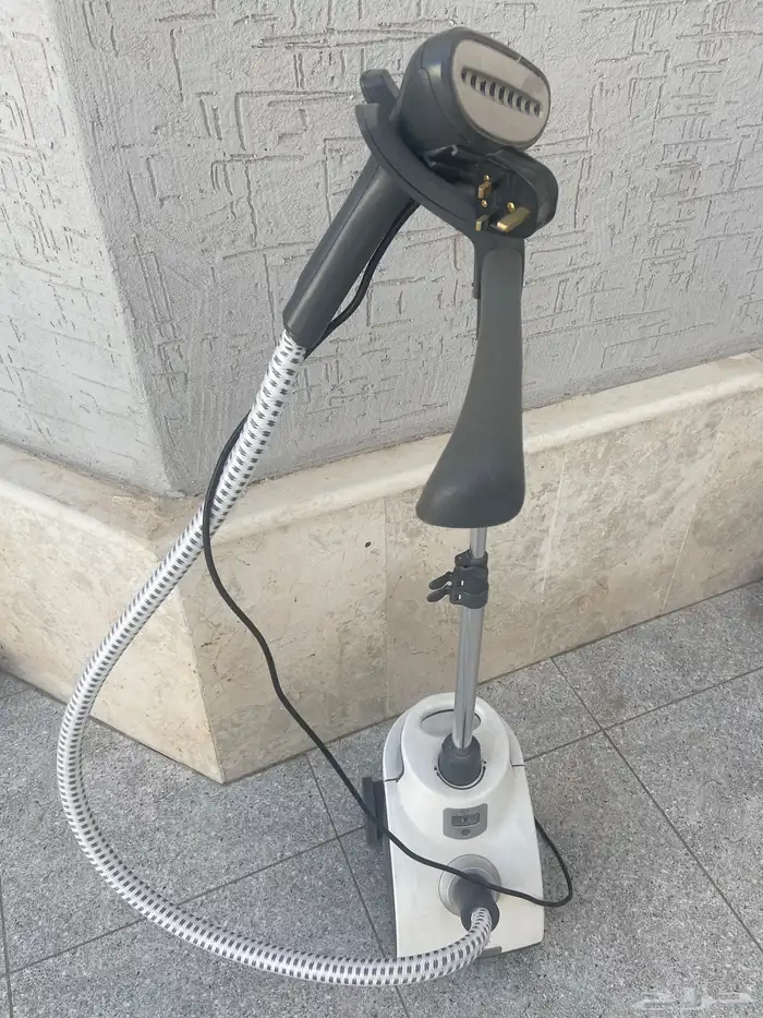 مكنسة كهربائية وكوايه 1