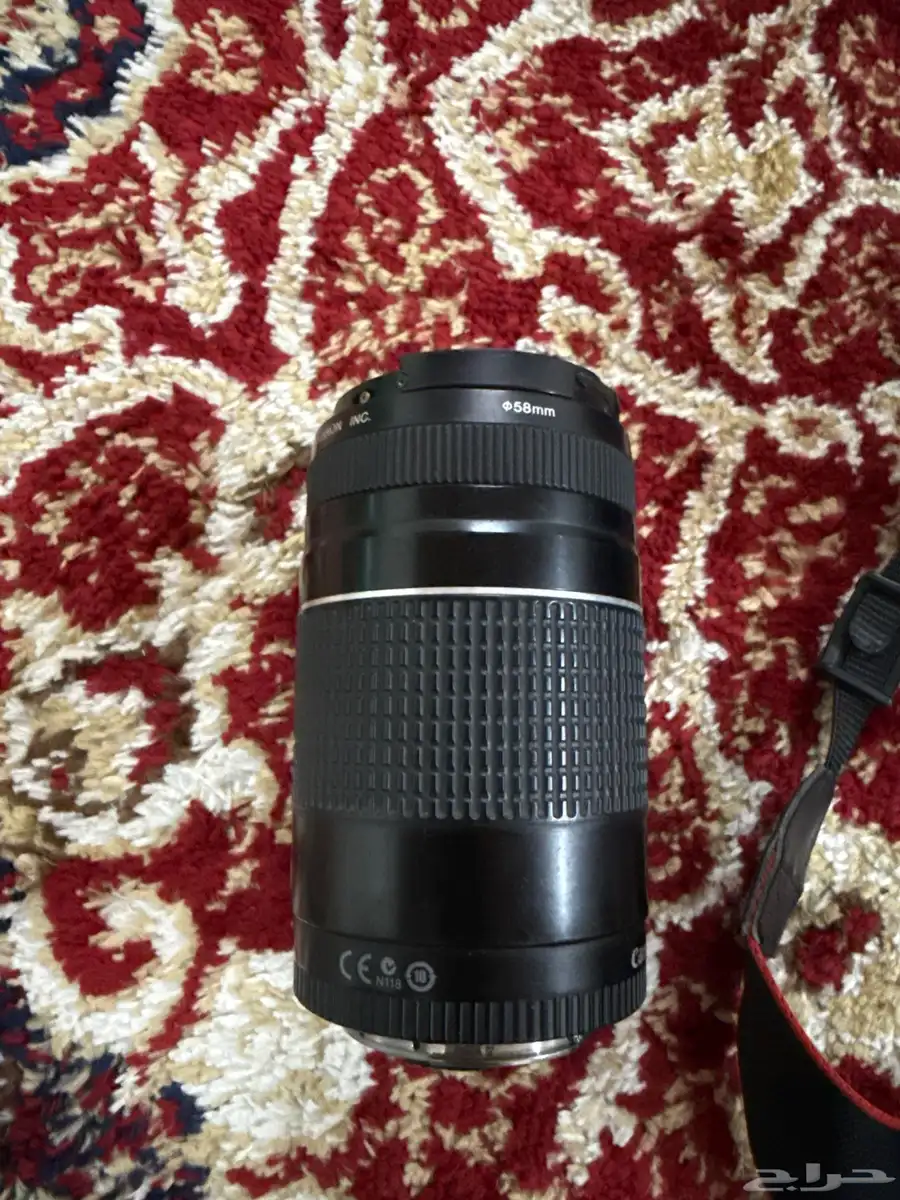 كامره كانون نوع كامره EOS 1100D مع شاحنها وزوم نوع LENS300 4