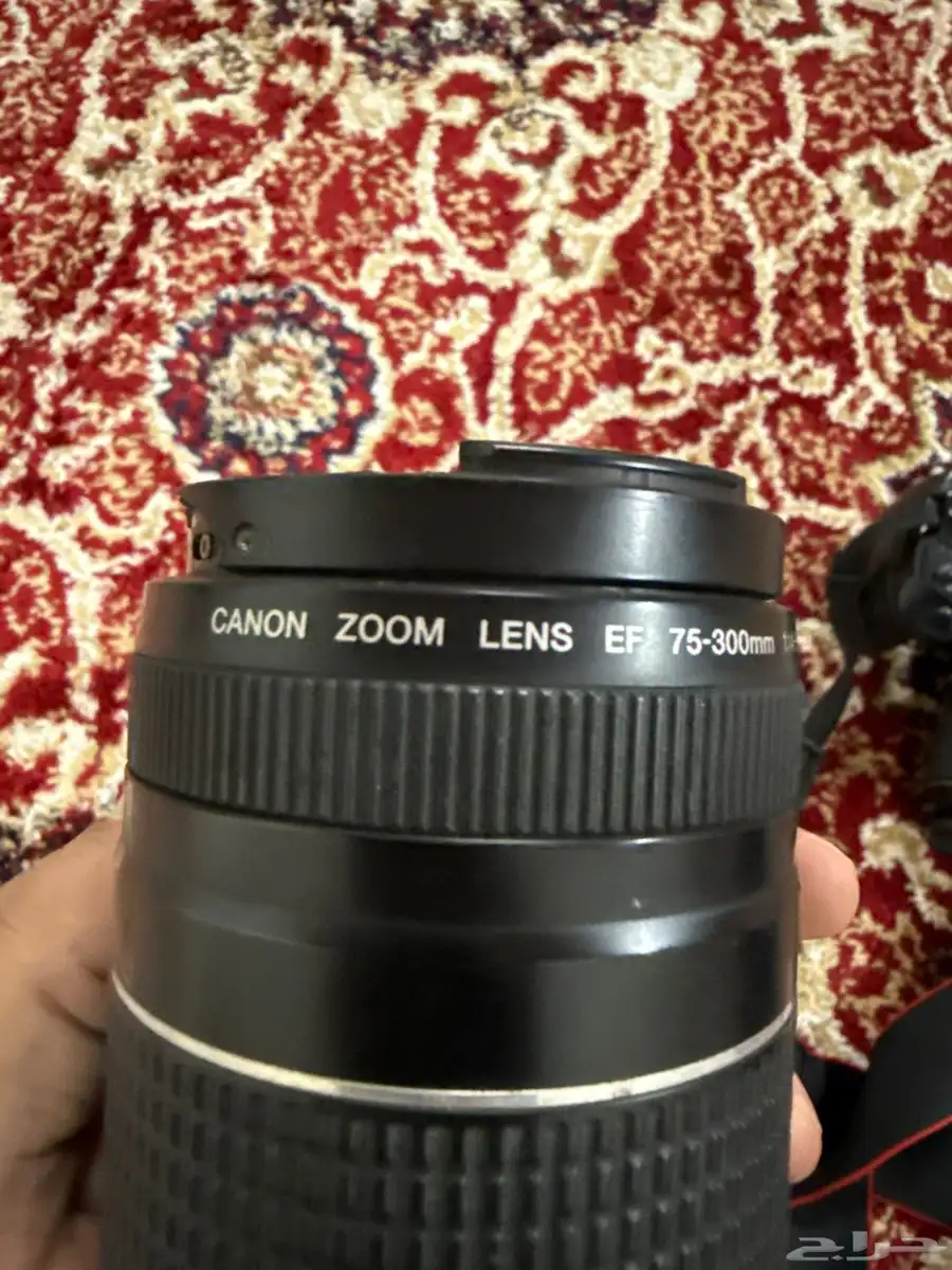 كامره كانون نوع كامره EOS 1100D مع شاحنها وزوم نوع LENS300 3