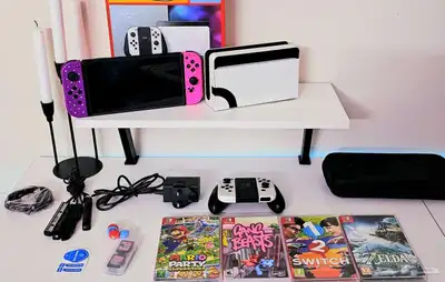 نينتندو سويتش OLED أبيض   4 ألعاب   ملحقات كاملة 0