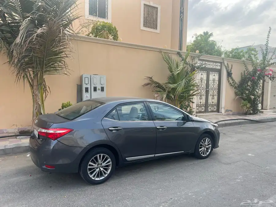 Toyota Corolla 2014   Mid Option (Push Start   OEM Rims) 4