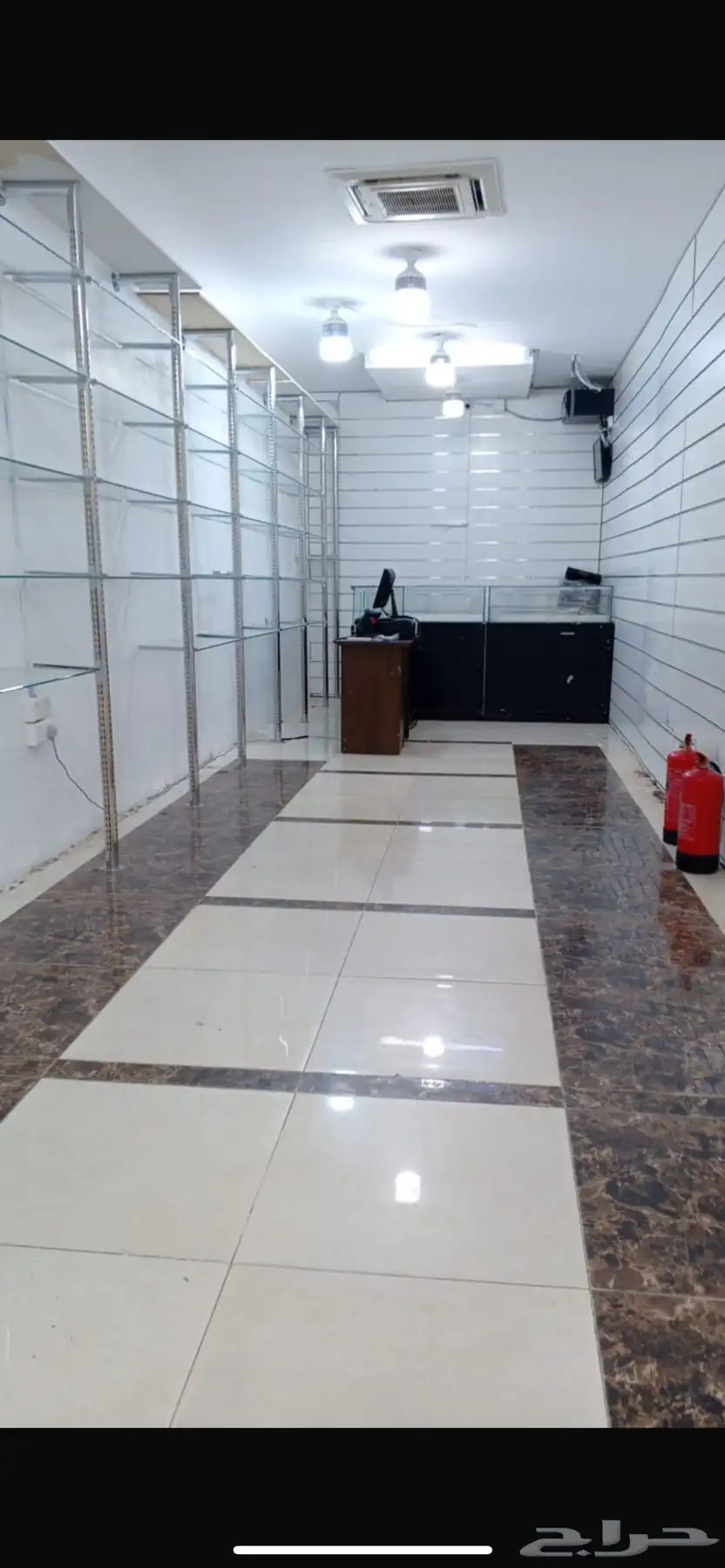 ديكور محل محفر كاميرات جهاز محاسبي مكيف 2
