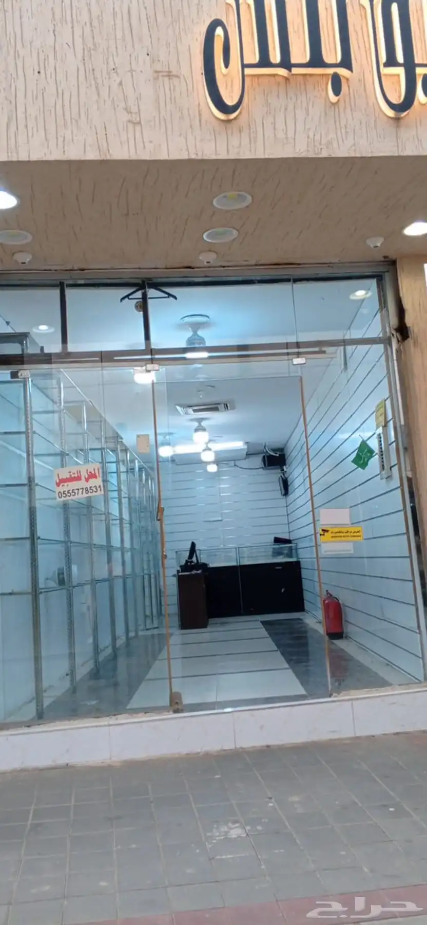 ديكور محل محفر كاميرات جهاز محاسبي مكيف 0