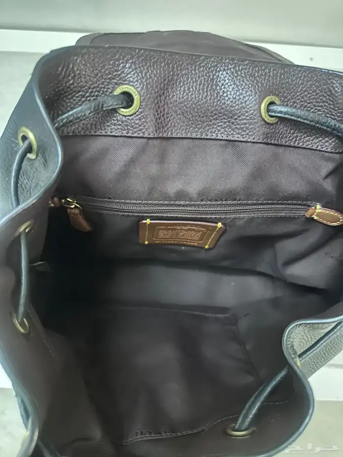 شنطة ماركة كوتش اصلية ميئه في الميئه 1