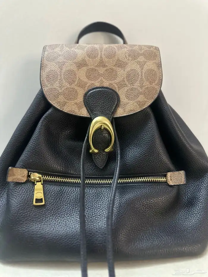 شنطة ماركة كوتش اصلية ميئه في الميئه 0