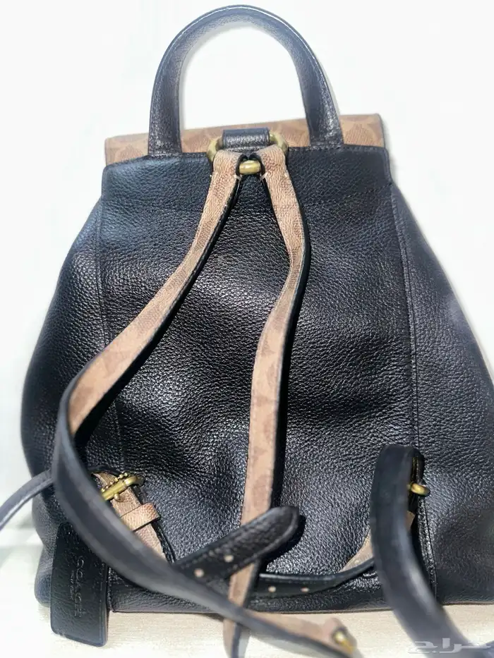 شنطة ماركة كوتش اصلية ميئه في الميئه 2