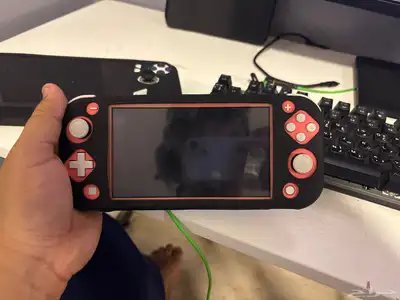 Nintendo switch light معها ذاكرة 32   شاشه حمايه  جراب 0